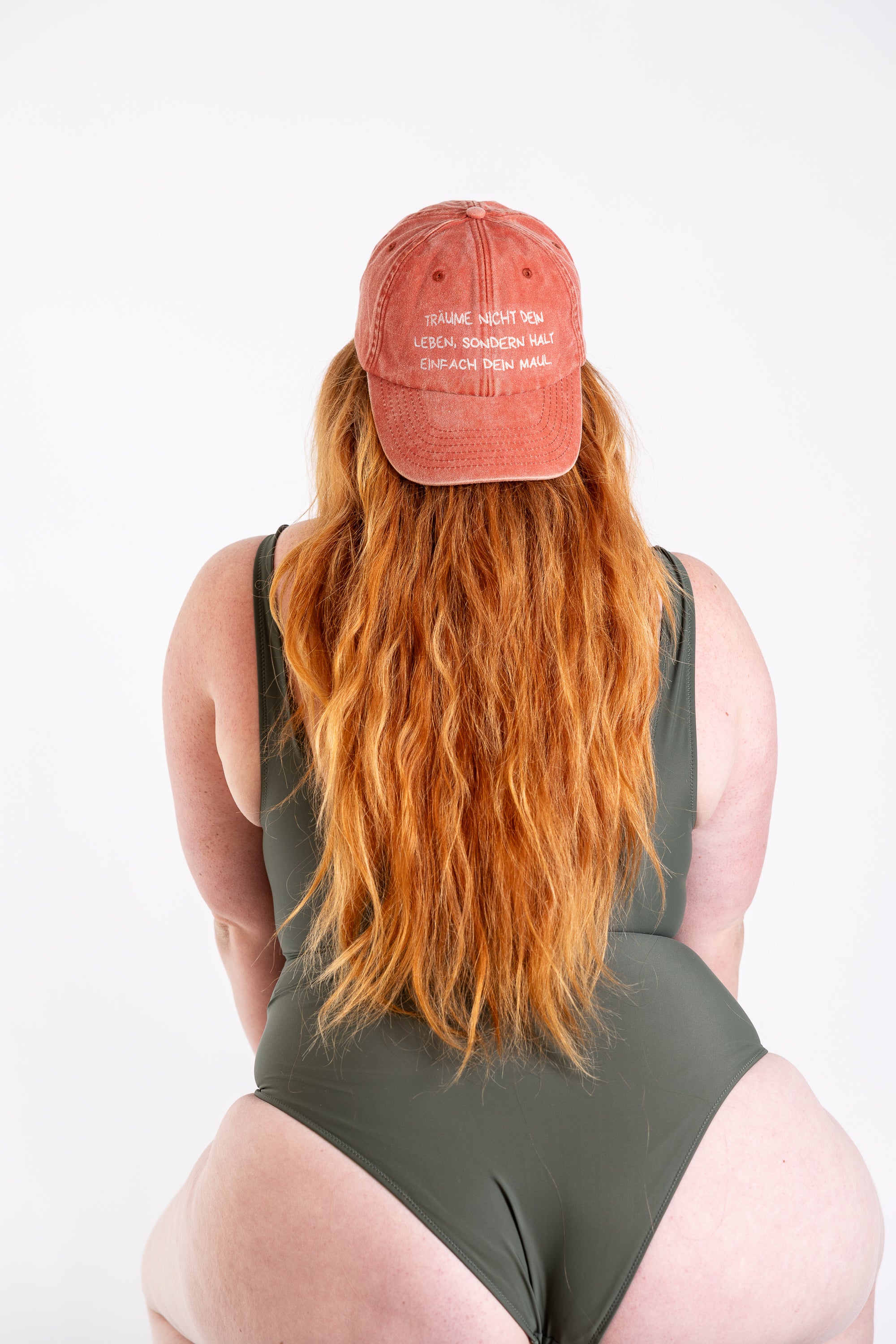 Base Cap "Träume nicht dein Leben" vintage orange